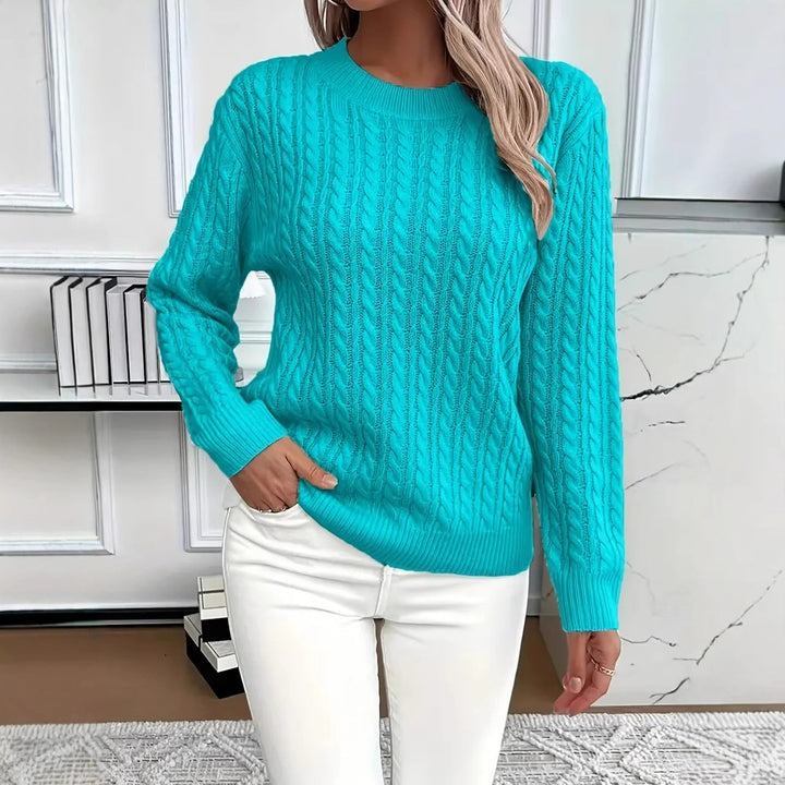 Stickad tröja med twistmönster och rund hals – elegant