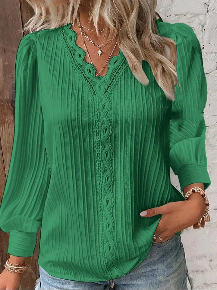 Rowena | Blus med spetsdetaljer och V-ringning