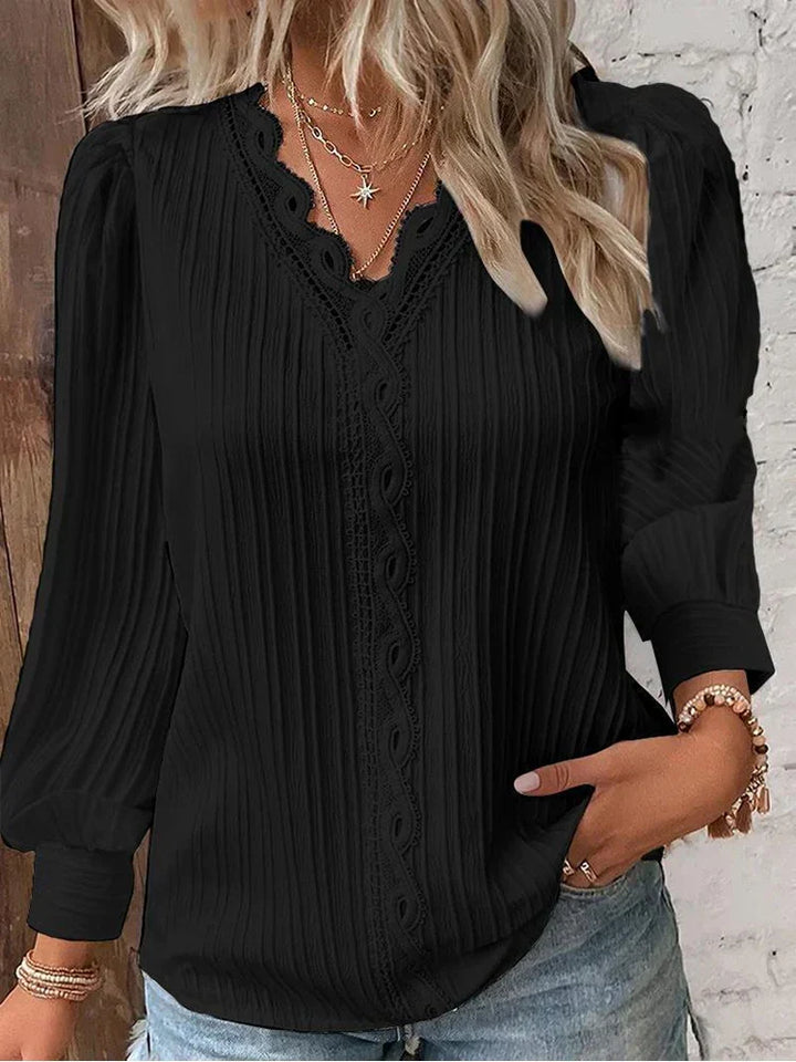 Rowena | Blus med spetsdetaljer och V-ringning